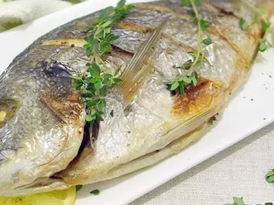 Фото: Дорада запечена у фользі