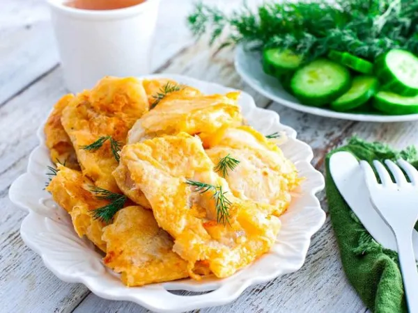 Фото: Соковите філе мінтая в клярі