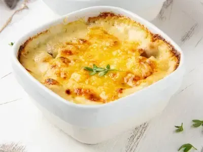 Котлети по-капітанськи з картоплею та помідорами